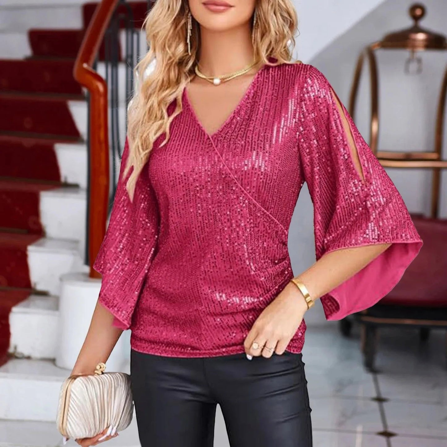 Céline | Glamourblus – Utsvängda ärmar och glittrande detaljer